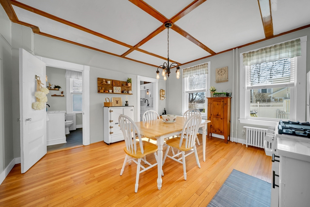 59 Washington Street Ipswich, MA 01938 - Photo 21 of 42 a view of a dining room with furniture and wooden floor