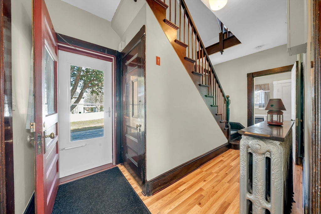 59 Washington Street Ipswich, MA 01938 - Photo 23 of 42 a view of entryway and hall with wooden floor