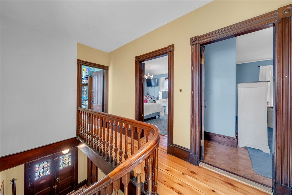59 Washington Street Ipswich, MA 01938 - Photo 27 of 42 a view of entryway with a window and wooden floor