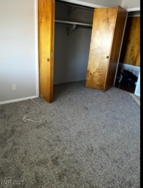 Undisclosed Address Boulder City, NV 89005 - Photo 6 of 19 Unfurnished bedroom featuring baseboards, carpet,