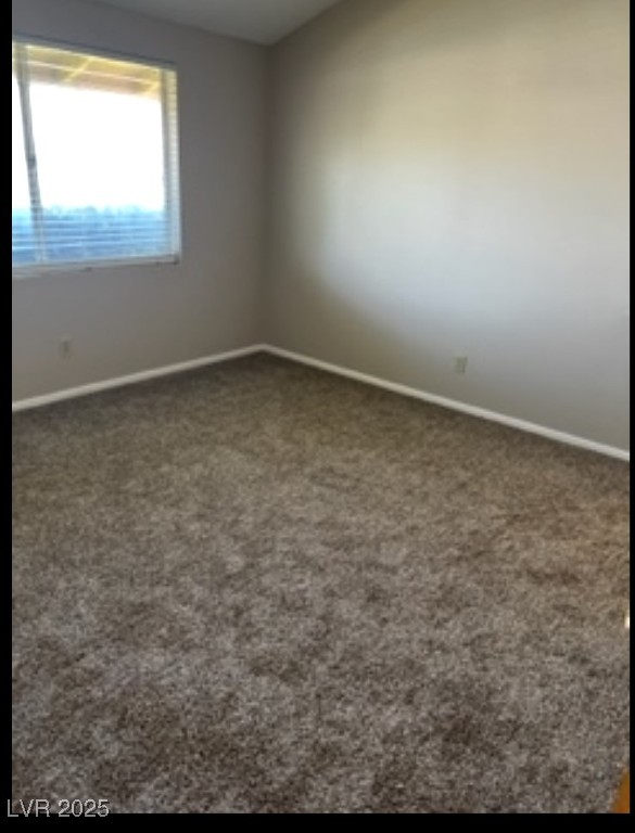 Undisclosed Address Boulder City, NV 89005 - Photo 7 of 19 Spare room featuring carpet floors and baseboards