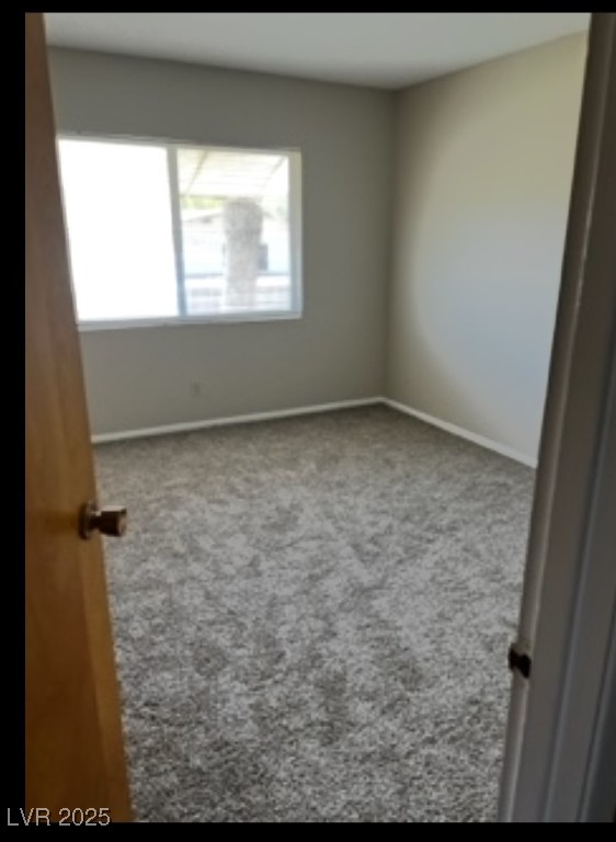 Undisclosed Address Boulder City, NV 89005 - Photo 9 of 19 Carpeted empty room with baseboards