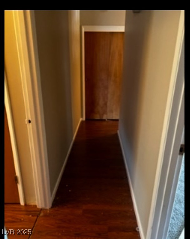 Undisclosed Address Boulder City, NV 89005 - Photo 10 of 19 Corridor with baseboards and wood finished floors
