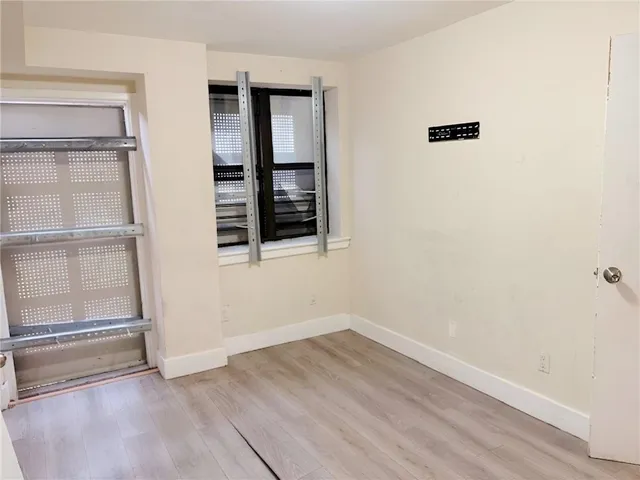 a bathroom with a sink toilet and mirror