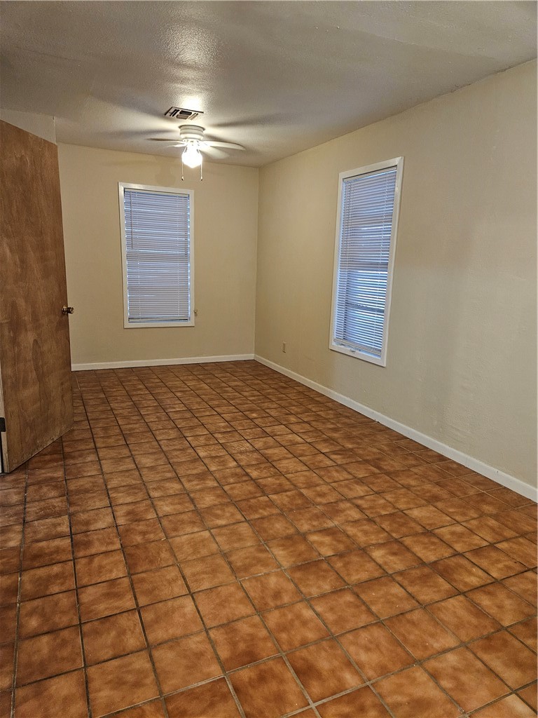 501 North Gregory Gregory, TX 78374 - Photo 4 of 6 a view of an empty room and window