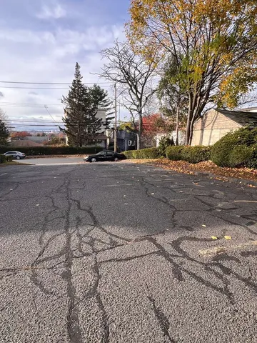 a view of road with trees