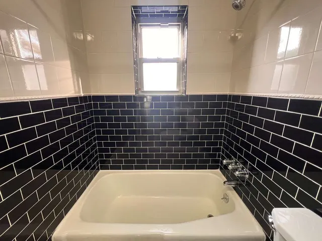a bathroom with a bathtub