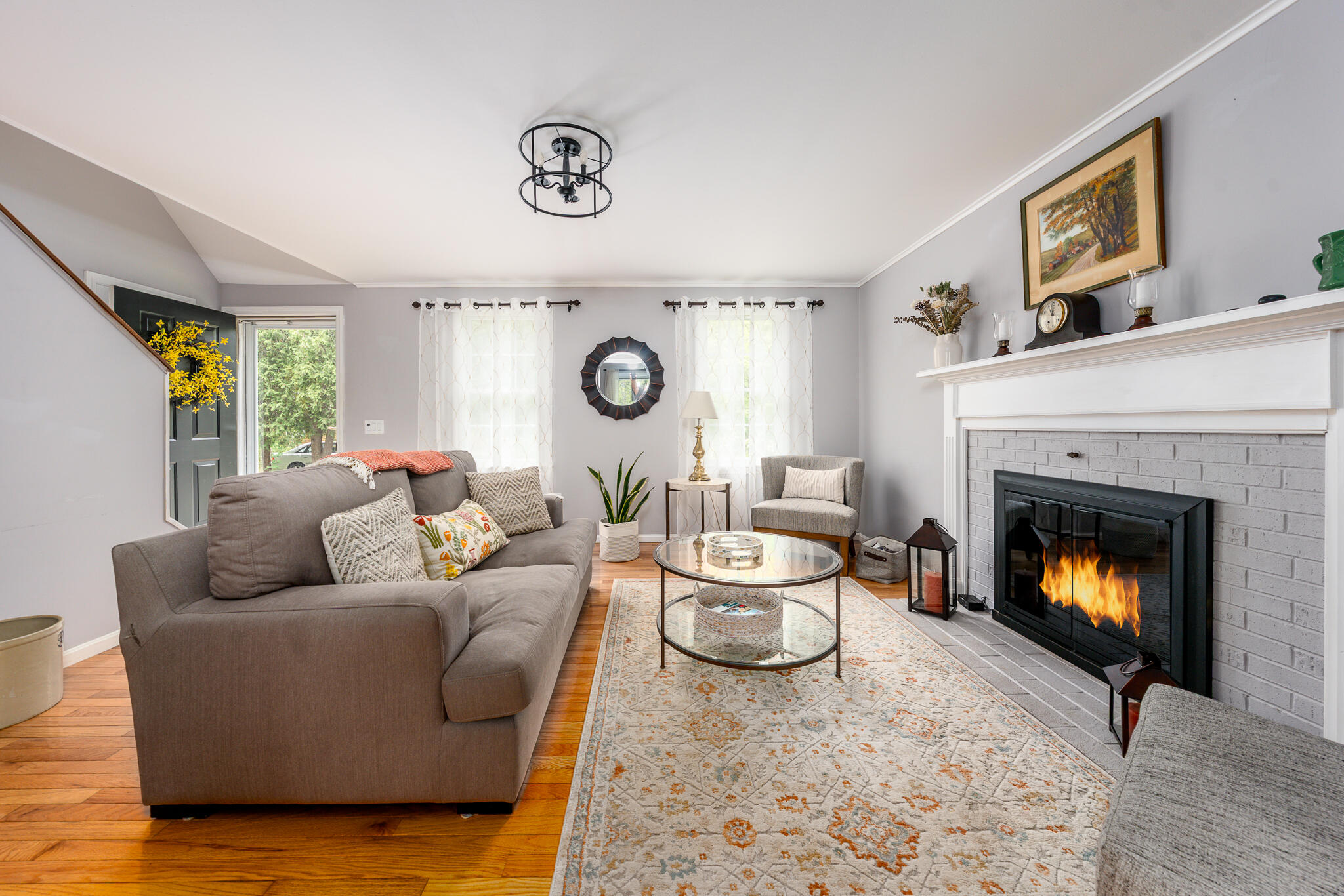 61 Angus Way Centerville, MA 02632 - Photo 8 of 59 a living room with furniture and a fireplace