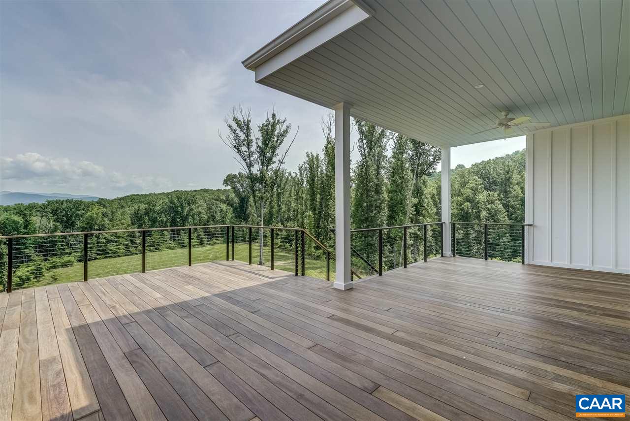 901 Tilman Road Charlottesville, VA 22901 - Photo 14 of 49 a view of swimming pool with wooden floor and fence