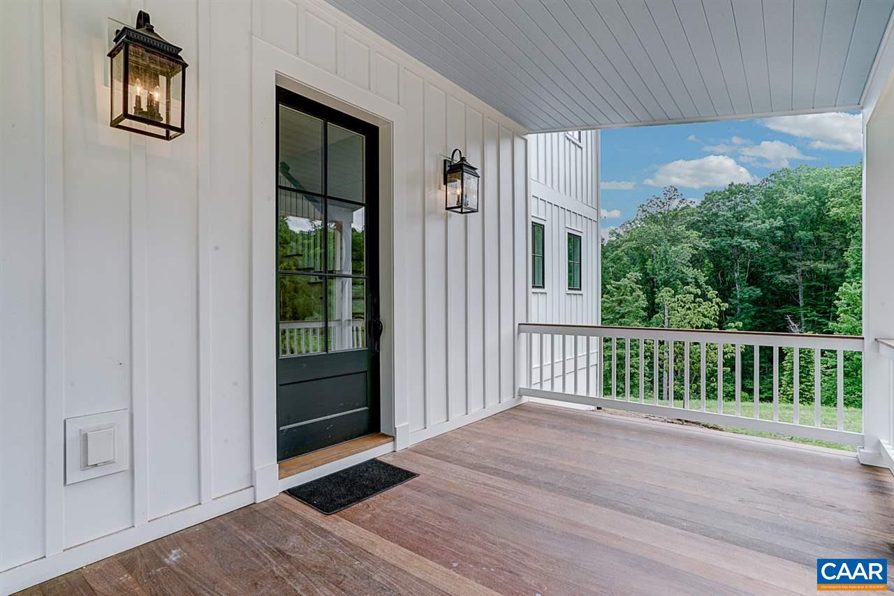 901 Tilman Road Charlottesville, VA 22901 - Photo 3 of 49 a view of a house with a porch