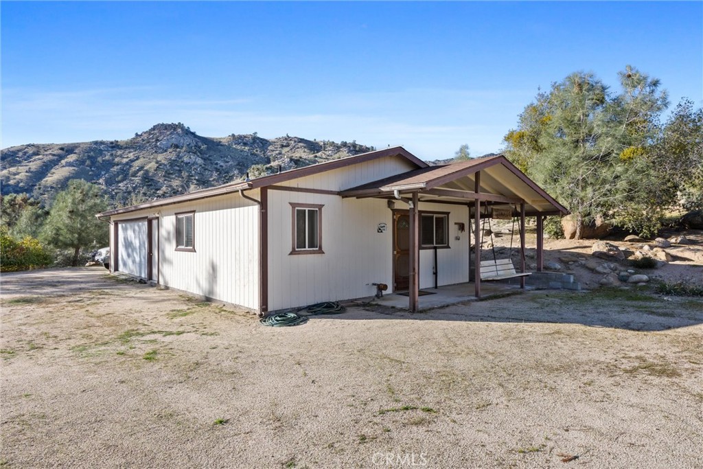 9990 Fay Ranch Road Weldon, CA 93283 - Photo 15 of 51 a view of a house with a yard