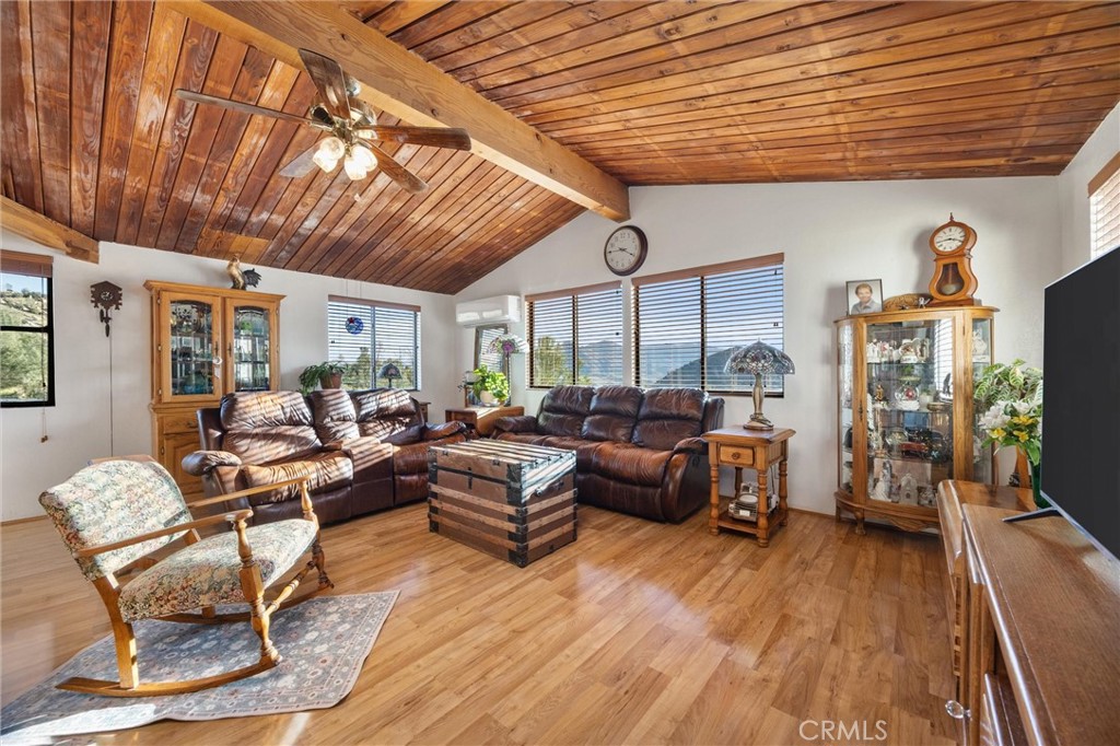 9990 Fay Ranch Road Weldon, CA 93283 - Photo 24 of 51 a living room with furniture and a flat screen tv