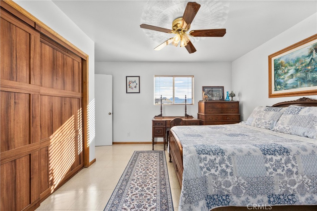 9990 Fay Ranch Road Weldon, CA 93283 - Photo 43 of 51 a bedroom with a bed and a window