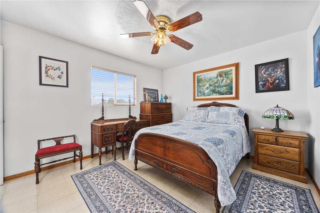 9990 Fay Ranch Road Weldon, CA 93283 - Photo 44 of 51 a bedroom with a bed and a dresser in it