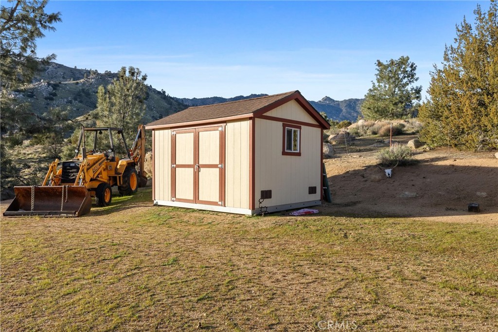 9990 Fay Ranch Road Weldon, CA 93283 - Photo 48 of 51 a view of a house with a outdoor space