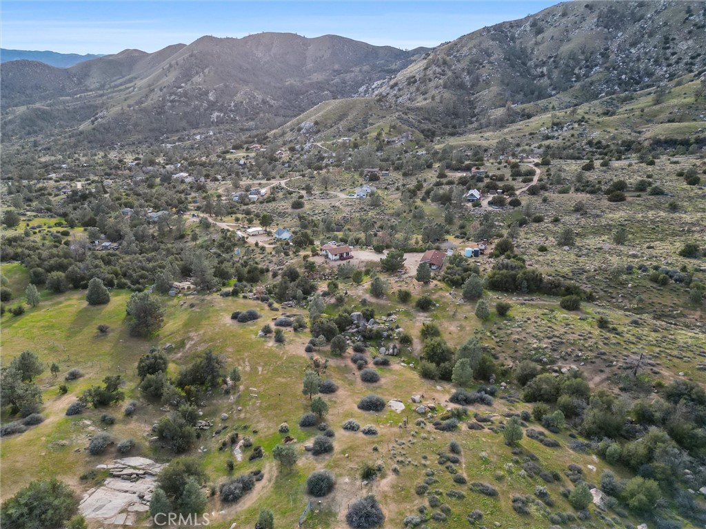 9990 Fay Ranch Road Weldon, CA 93283 - Photo 10 of 51 a view of a forest with a mountain in the background