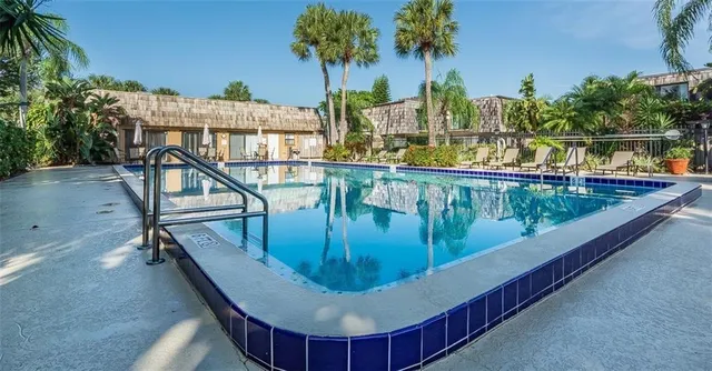 a view of a balcony with chairs