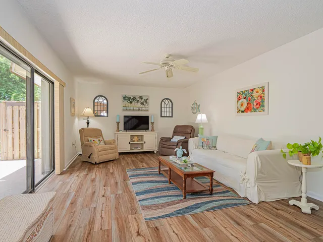a living room with furniture and a table