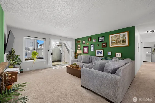 a living room with furniture and a couch