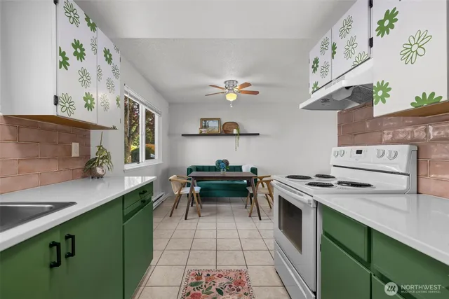 a kitchen with a stove and a sink