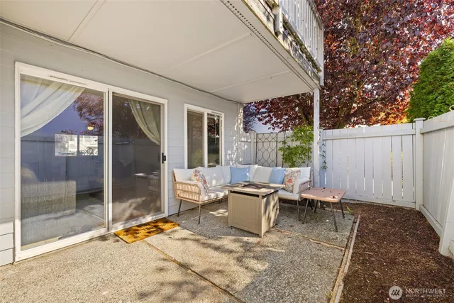 a outdoor space with patio furniture and a potted plant