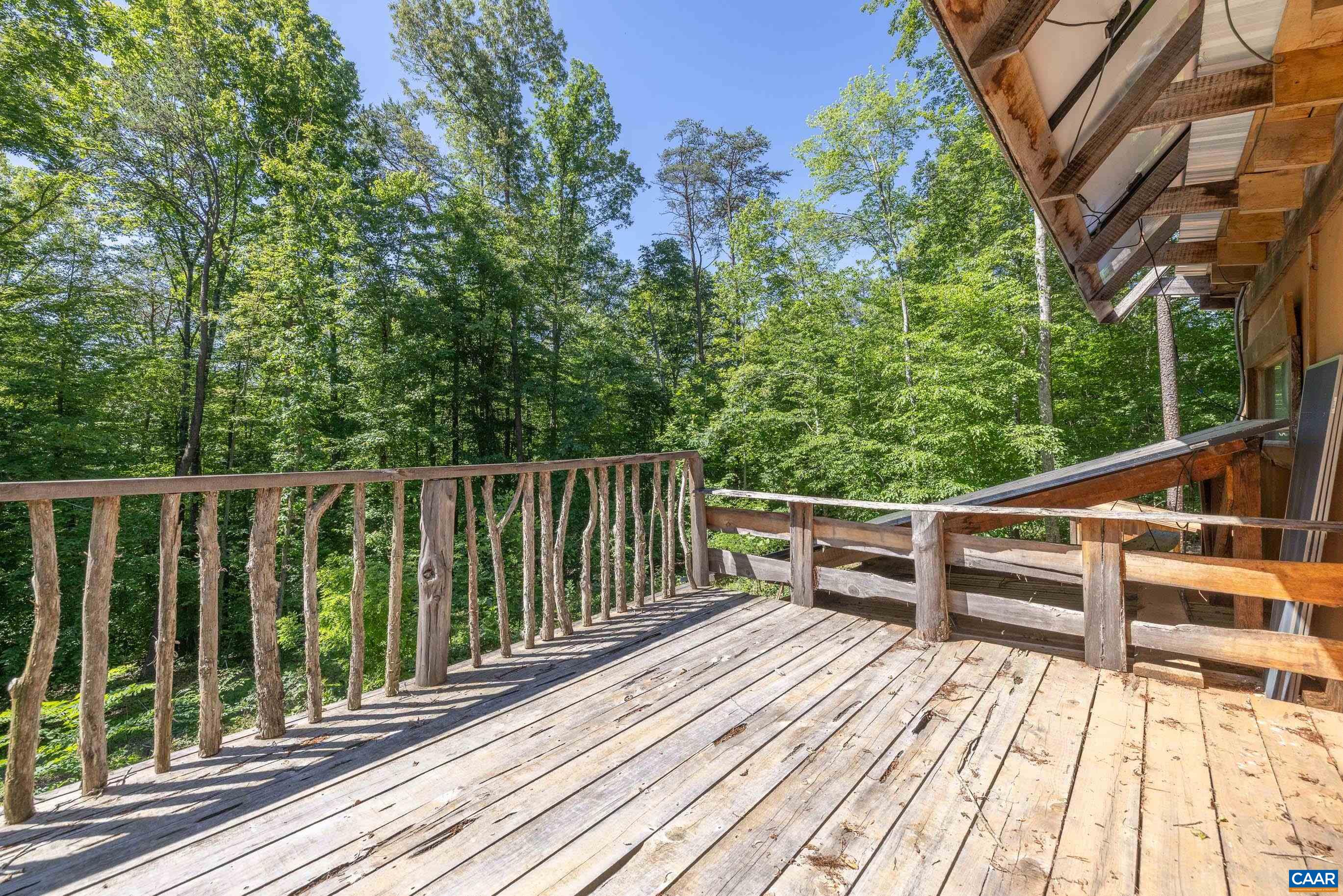 7676 Old Dominion Road Schuyler, VA 22969 - Photo 14 of 29 a view of balcony with wooden floor and fence