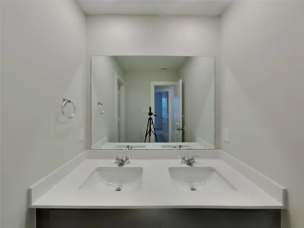 a view of house with backyard