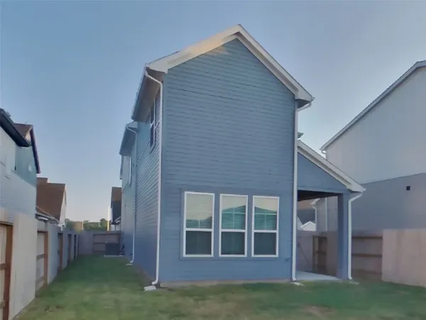 a view of swimming pool with outdoor seating and city view