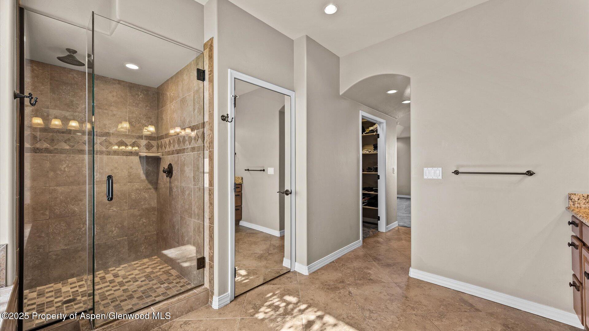 1984 J Road Fruita, CO 81521 - Photo 20 of 40 a bathroom with a shower and a sink