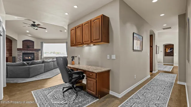 a view of a livingroom with furniture and a rug