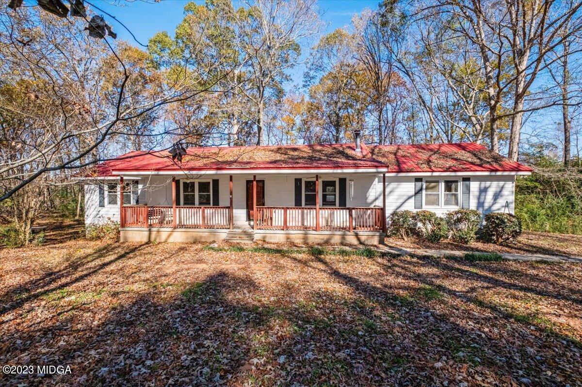 546 Old Union Gin Road Forsyth, GA 31029 - Photo 1 of 23 a front view of a house with a yard