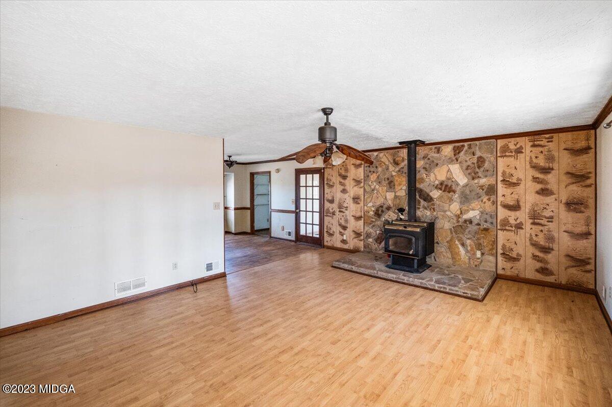 546 Old Union Gin Road Forsyth, GA 31029 - Photo 3 of 23 an empty room with windows