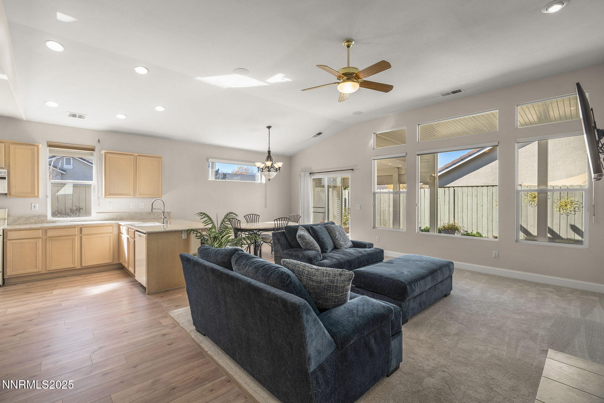 10145 Donner Peak Drive Reno, NV 89521 - Photo 2 of 32 a living room with furniture and a large window