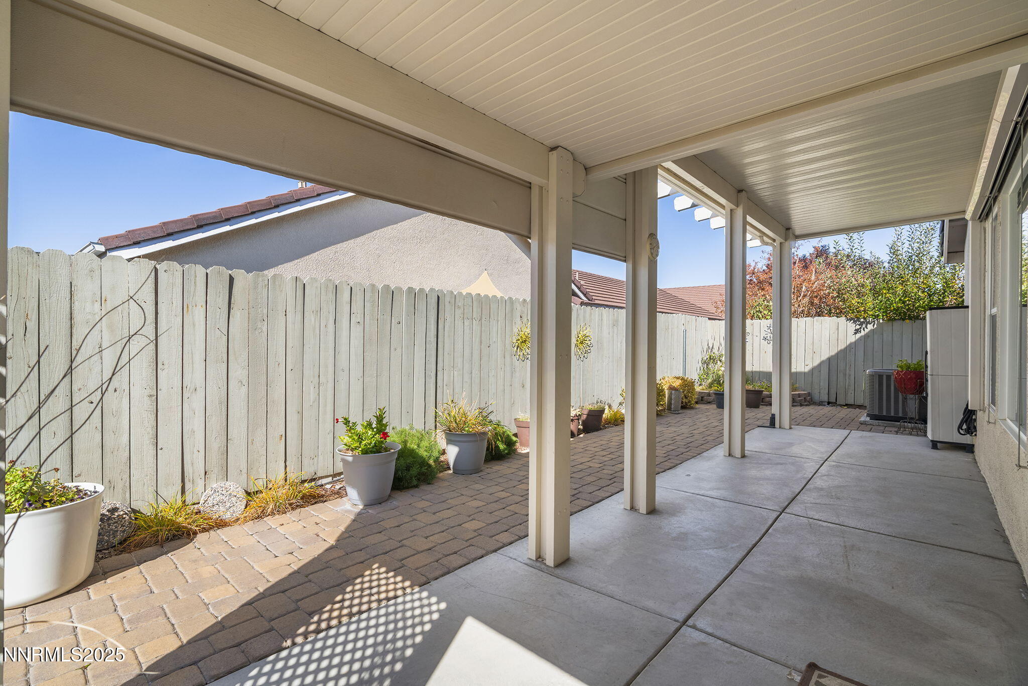 10145 Donner Peak Drive Reno, NV 89521 - Photo 22 of 32 a lobby with furniture and floor to ceiling window