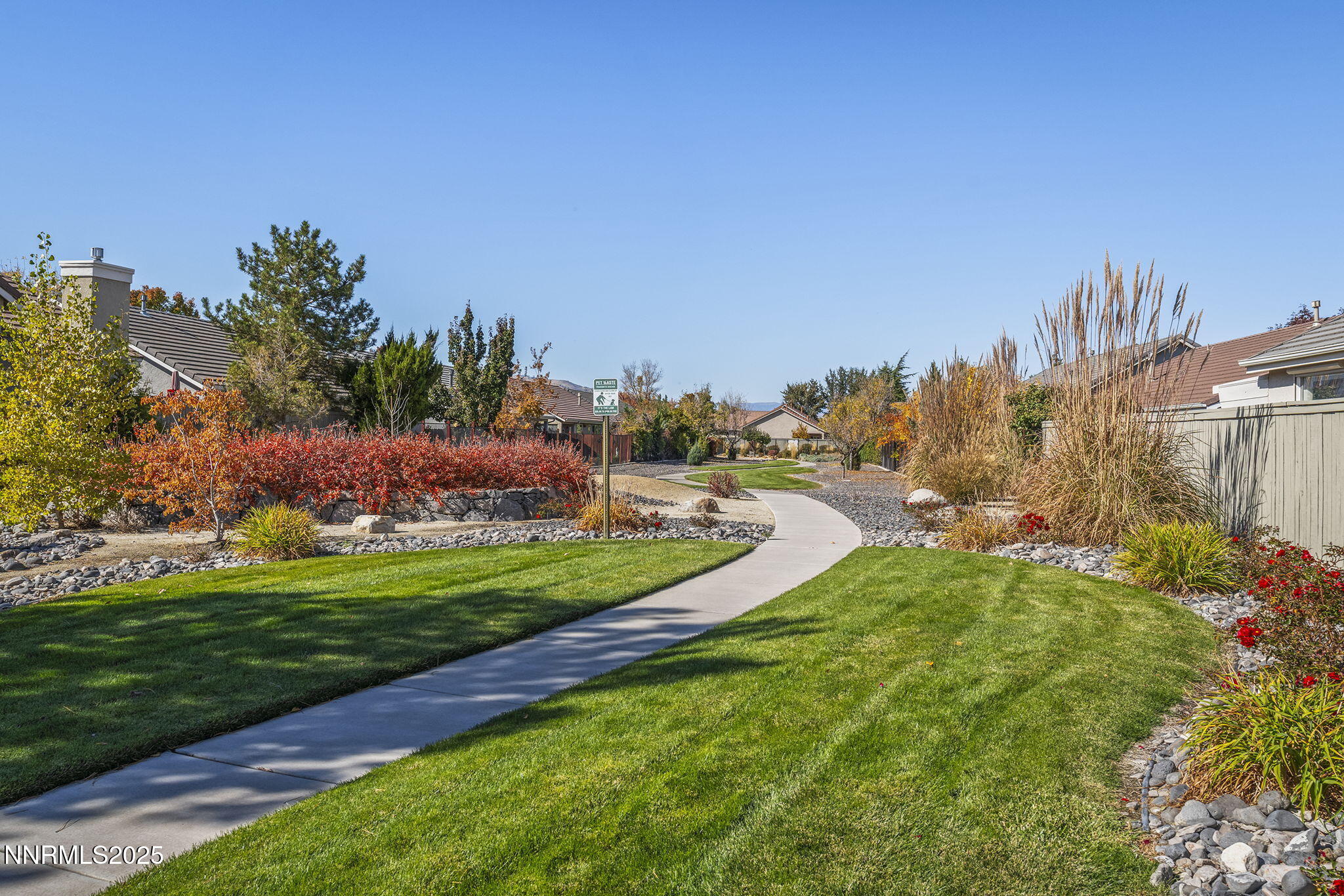 10145 Donner Peak Drive Reno, NV 89521 - Photo 25 of 32 a view of a golf course with a garden
