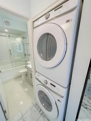 a bathroom with a toilet and a sink