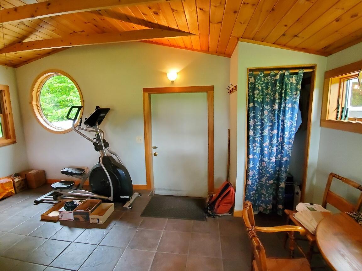 92 Huff Road Cornville, ME 04976 - Photo 6 of 121 mudroom links garage to kitchen