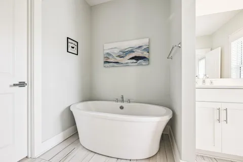 a bathroom with a shower and a toilet