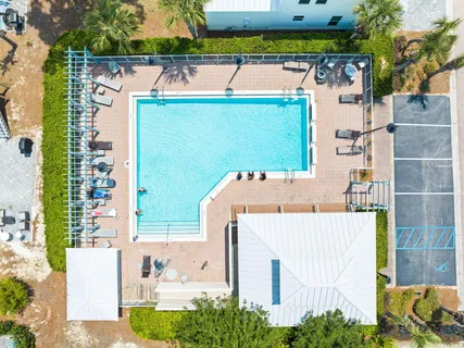a view of a swimming pool with a patio