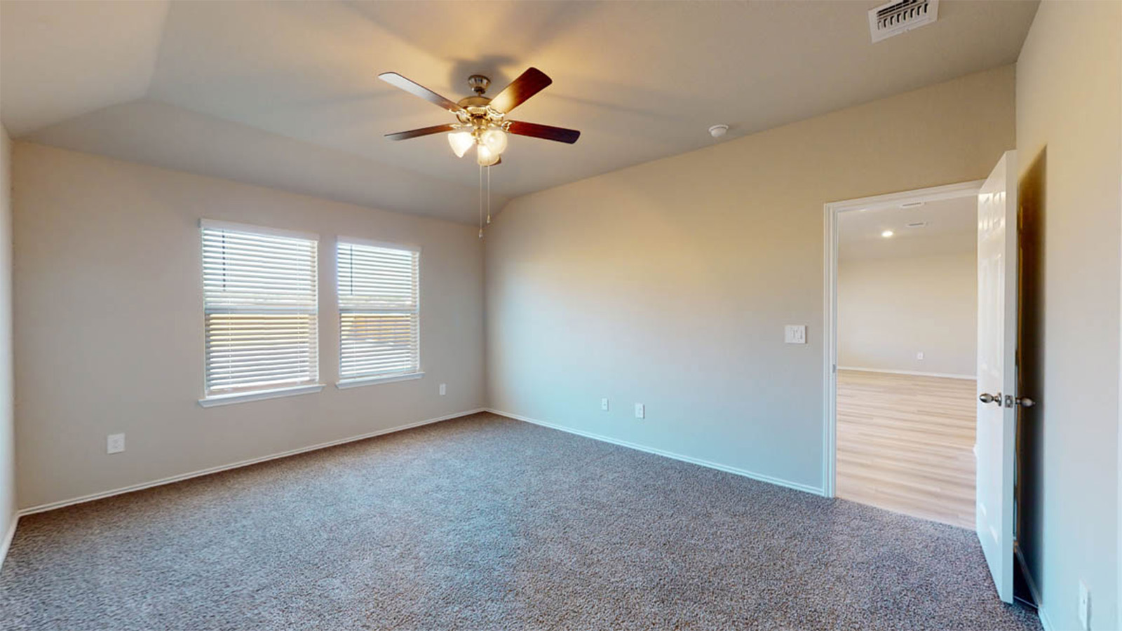 1407 Victory Rnch Trail Killeen, TX 76549 - Photo 12 of 24 A well-proportioned bedroom with vaulted ceilings and ample natural light through dual windows.