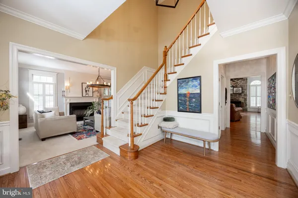 a living room with furniture fireplace and window