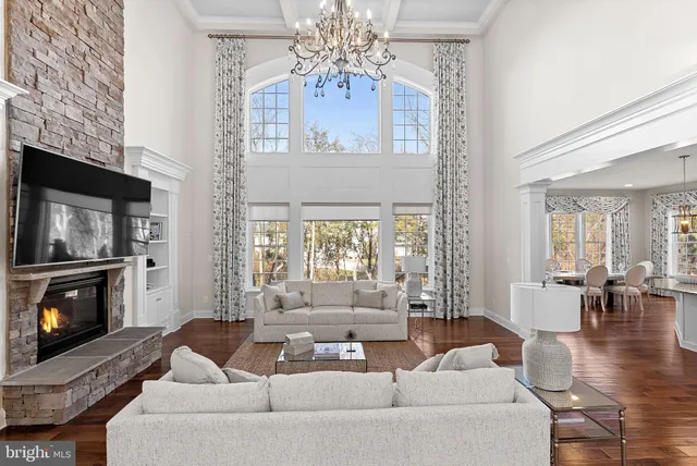 a living room with furniture and a table
