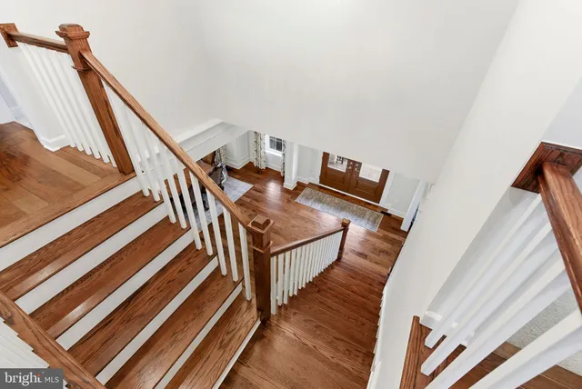 a bed room with a bed and a chair