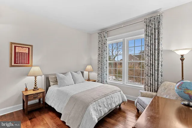a view of a two chairs in the balcony