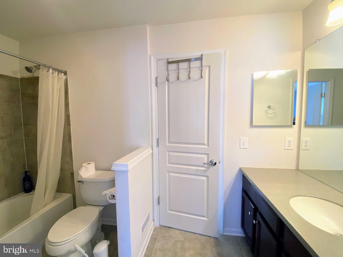 1403 Hampshire Lane Chester Springs, PA 19425 - Photo 16 of 31 a bathroom with a granite countertop sink toilet and shower