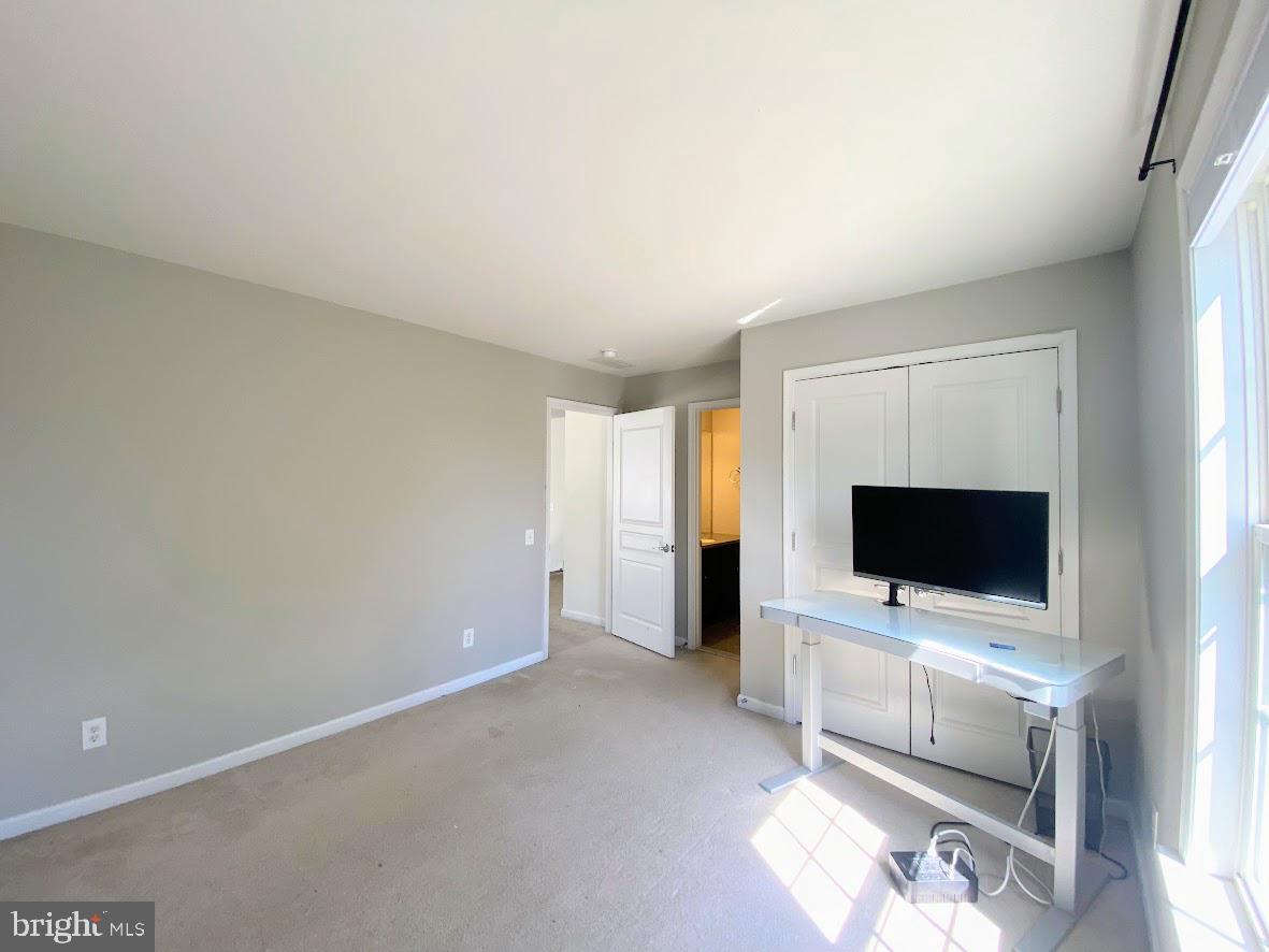 1403 Hampshire Lane Chester Springs, PA 19425 - Photo 17 of 31 a view of room with flat screen tv