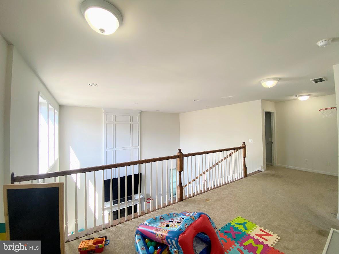 1403 Hampshire Lane Chester Springs, PA 19425 - Photo 19 of 31 a bedroom with furniture and a window