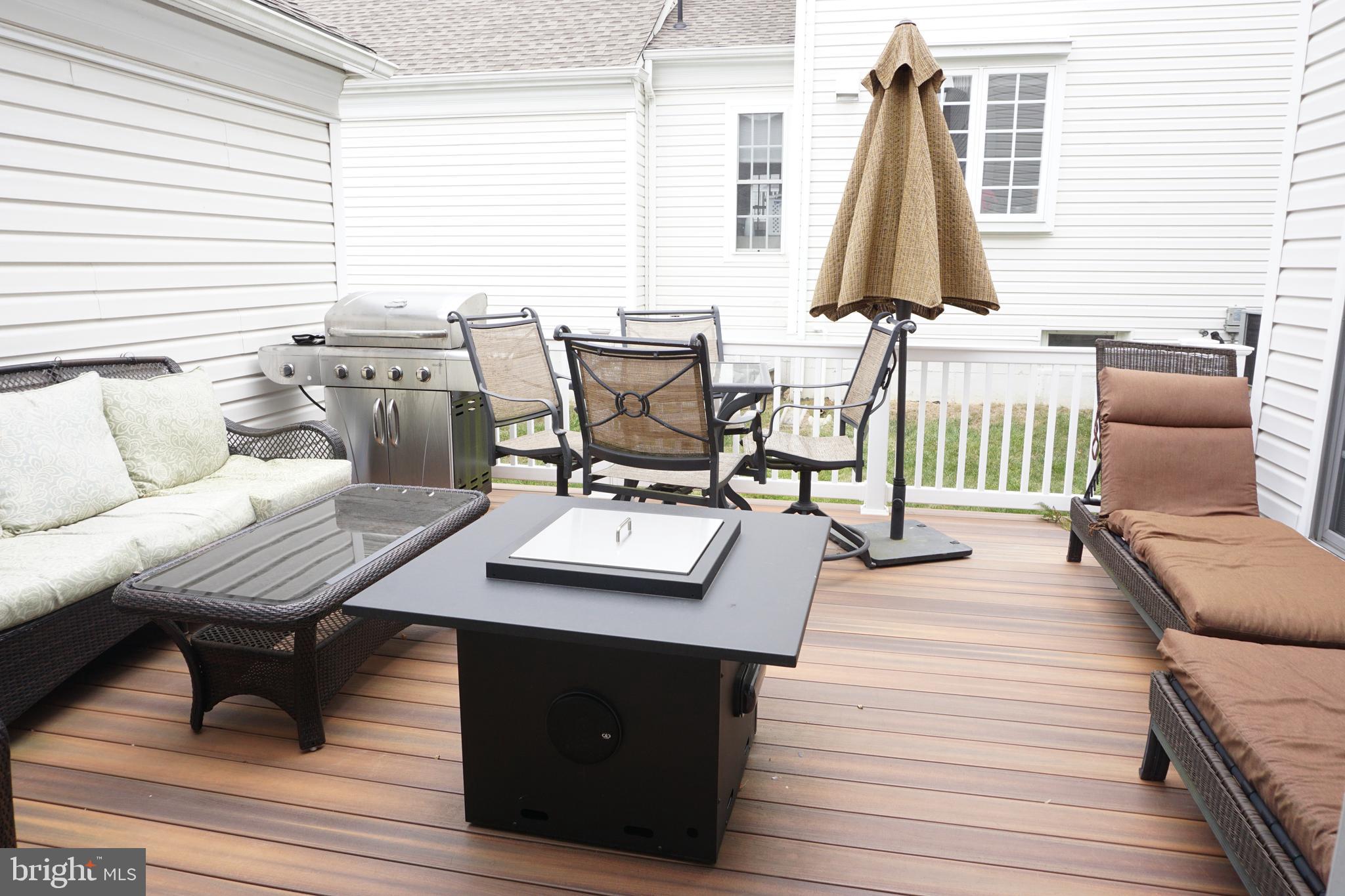 1403 Hampshire Lane Chester Springs, PA 19425 - Photo 22 of 31 a view of a patio with table and chairs