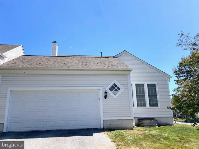 a view of front door and house