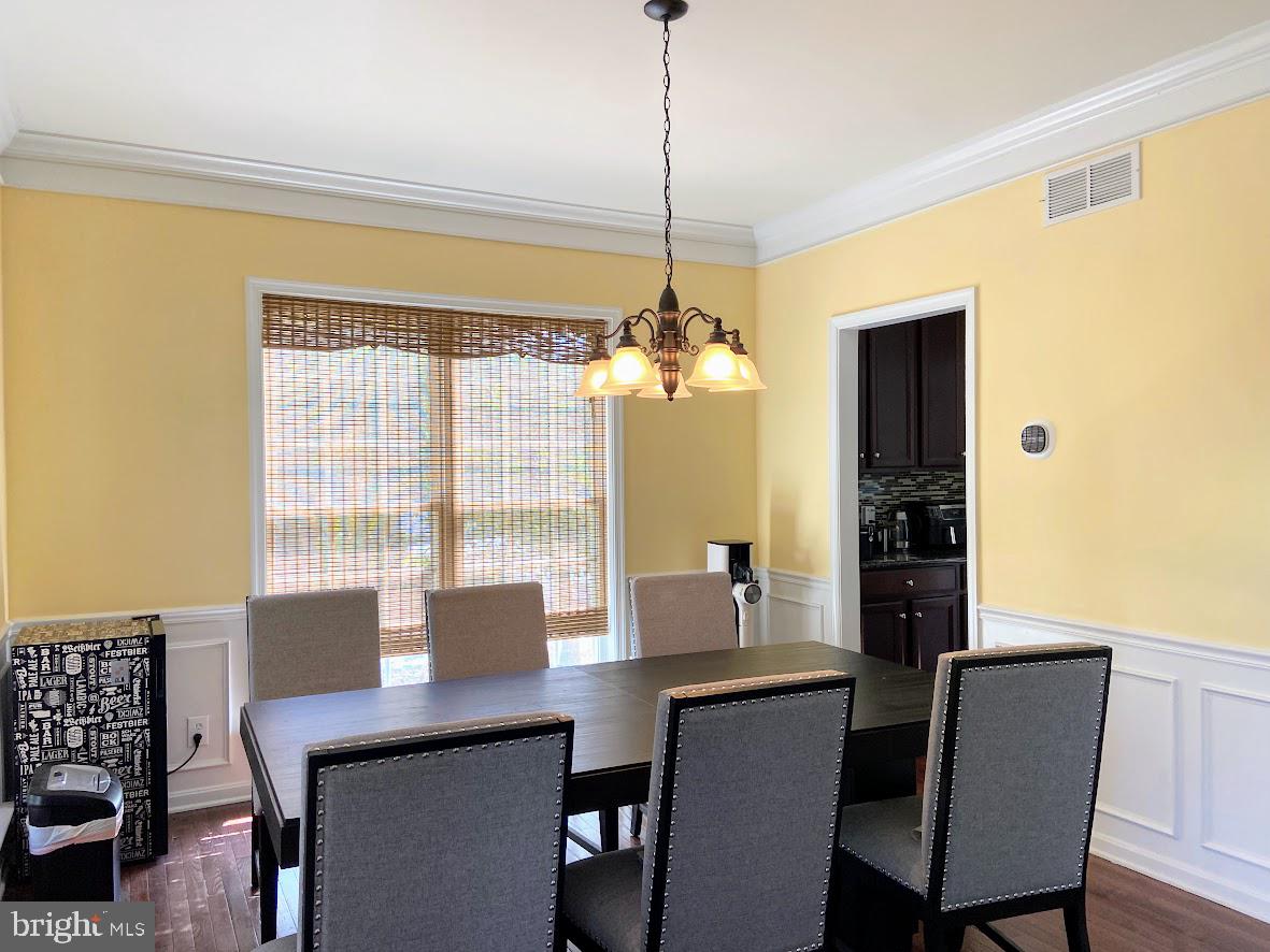 1403 Hampshire Lane Chester Springs, PA 19425 - Photo 4 of 31 a dining room with furniture and window